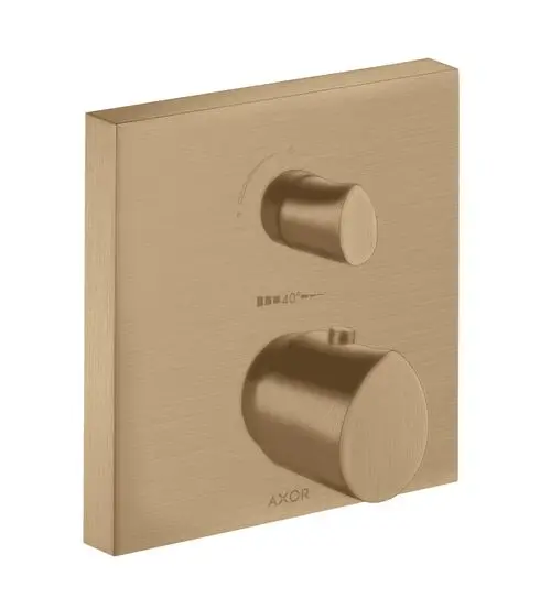 Thermostat mit zwei Reglern zur Temperatur- und Umstellungseinstellung, montiert auf einer quadratischen bronze-farbenen Fläche. Marke AXOR sichtbar.